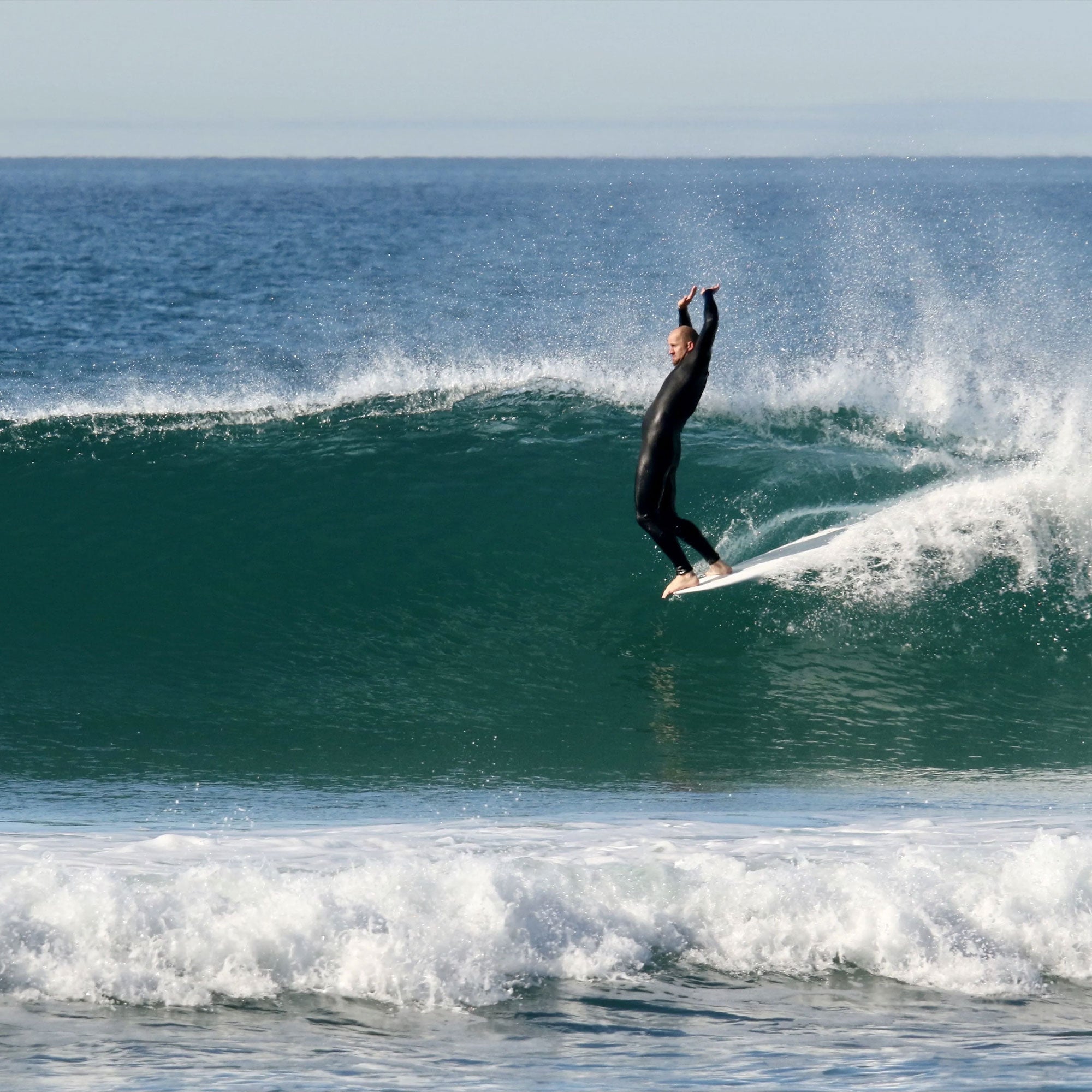 Taylor Jensen riding The Singleton longboard